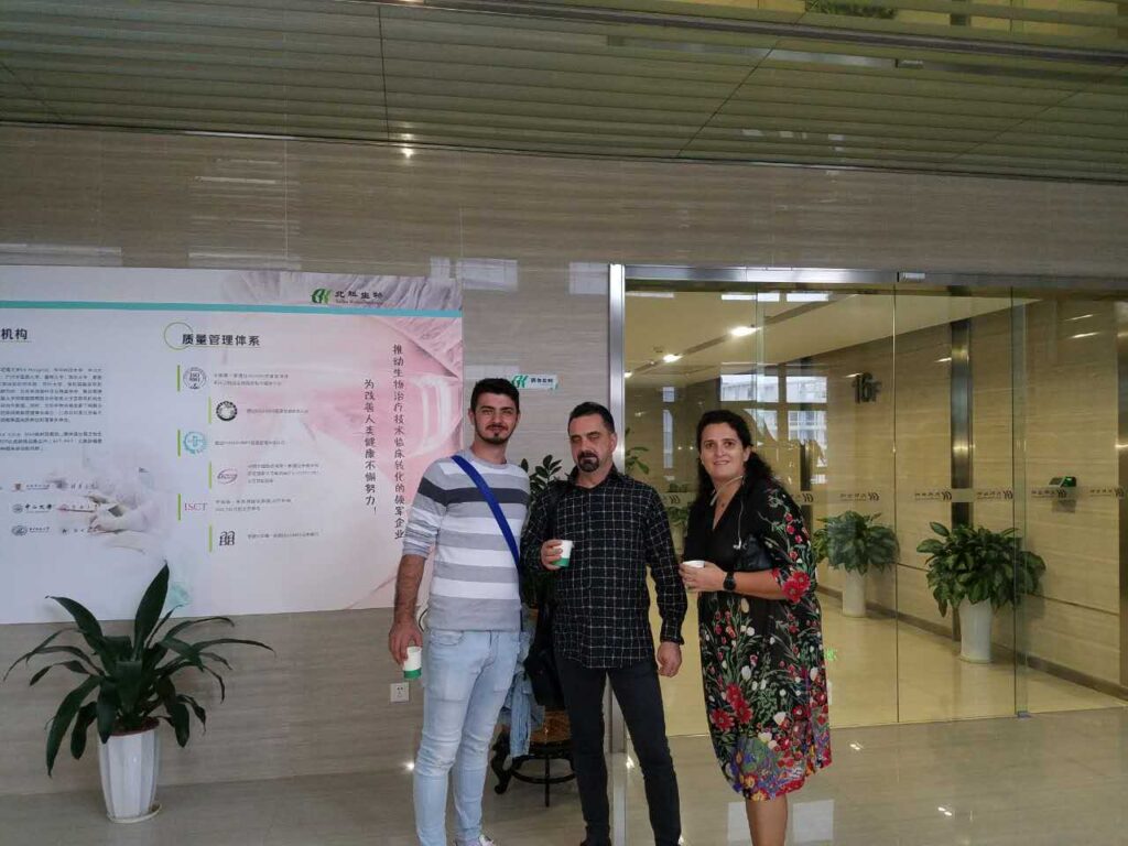 Ovidiu Simion and his son with Alina in the Beike office.